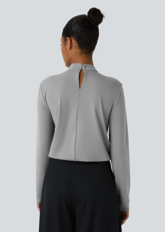 BLUSA CON CIERRE TRASERO